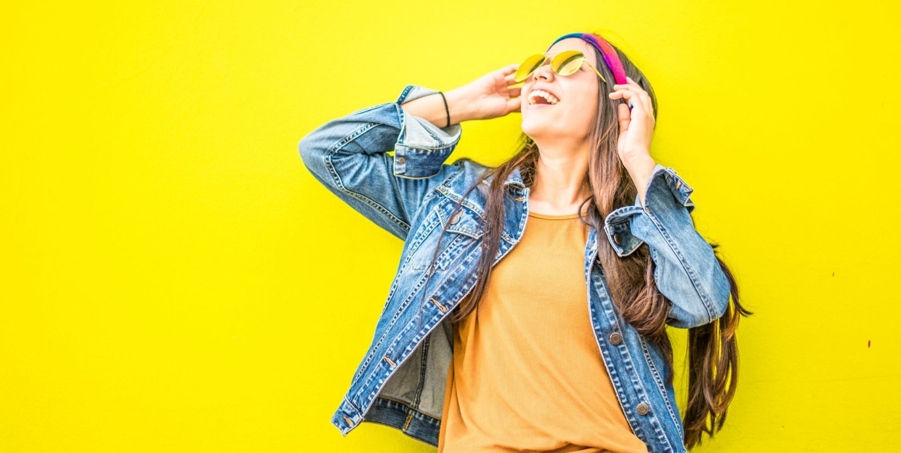 smiling women in jean jacket